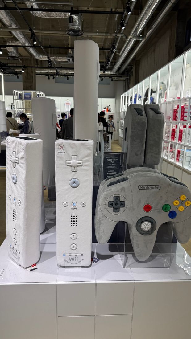Giant plush Wii and N64 controllers at the Nintendo Museum